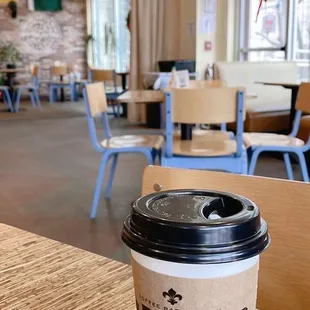 a coffee cup on a table