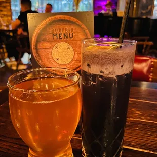 &quot;j.k.&apos;s scrumpy hard cider&quot; (left) and &quot;if you like ube coladas&quot; (rum, coconut, ube, lime, pineapple)