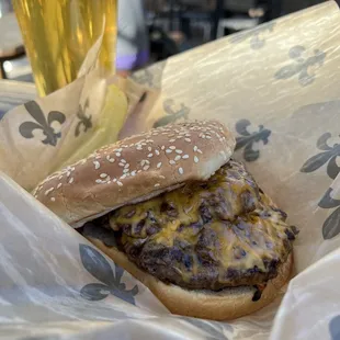 a burger and a glass of beer