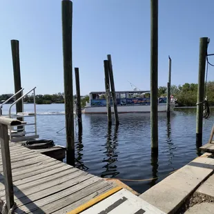 a boat docked at a dock