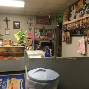 The shop ordering counter, as seen by the waiting area bench.  Fun decor with local charm!