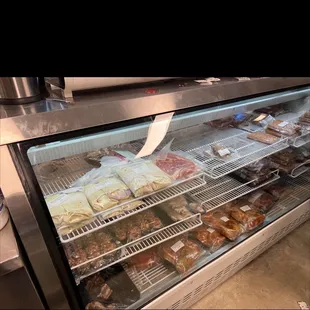 a display case of various foods