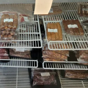 a variety of sausages on display