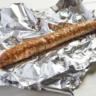 a sausage wrapped in tin foil
