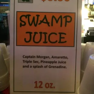 a sign for swamp juice
