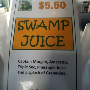 a sign for swamp juice