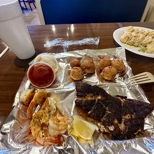 Blackened Shrimp/Snapper, and Hush Puppies.