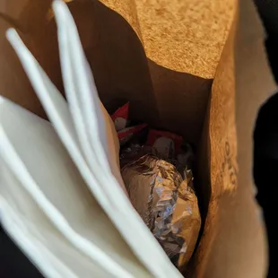 Bread with napkins and sauces