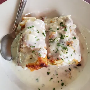 a plate of food with a spoon