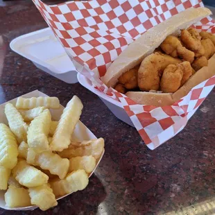 Shrimp po' boy and French fries