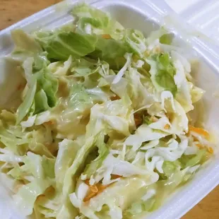 Coleslaw, very sweet. At first I thought it was salad.