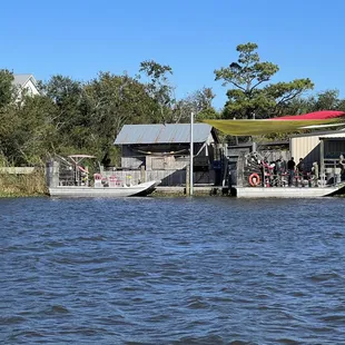 The boat we took in the right verses what we paid for in the left. Smaller gets you into tighter areas to see more gators