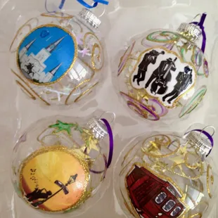 Assorted ornaments.Made in America, hand painted in New Orleans. A Bayou Threads Gifts exclusive.