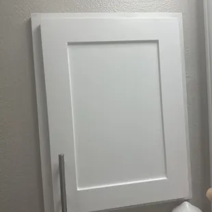 Cabinet that is very obviously off-center.