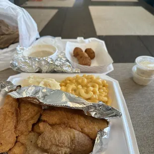 Catfish lunch special with two sides and I ordered hush puppies! 12.99