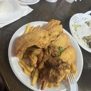 The catfish combo with shrimp and oysters.