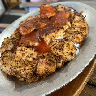 Chicken with a tomato cream sauce