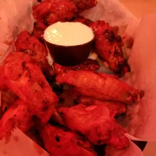 a basket of chicken wings
