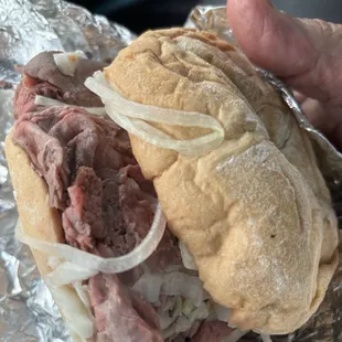 Pit, beef with onions, coleslaw, and horseradish