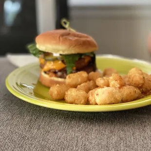 a burger and tater tots