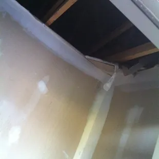 Ceiling damage in outdoor closet.