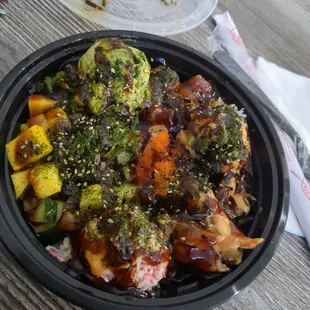 broccoli, carrots, and other vegetables in a bowl