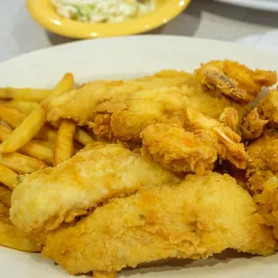 a plate of fried fish and fries