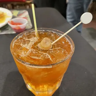 a drink with a toothpick in it