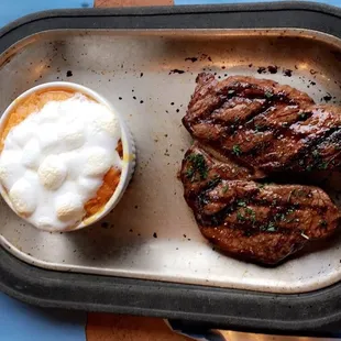 7 oz sirloin steak w/ sweet mashed potatoes and marshmallows on top.