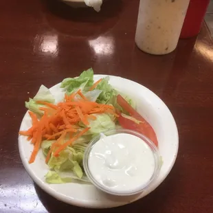 Salad with bleu cheese dressing on the side