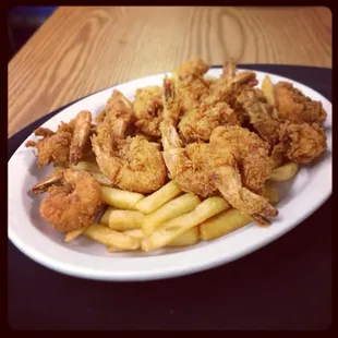 Fried Shrimp and oysters with Fries.