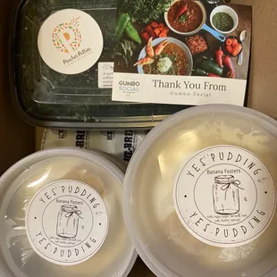 How the meal comes in a box (banana fosters pudding) - just part of the meal for 4 shown