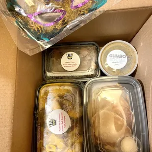 Really generous portions plus a Mardi Gras mask  - just part of the meal for 4 shown