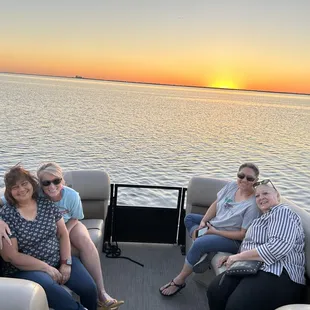 Friends enjoying a Sunset cruise with Baywatch Tours CC  from Padre Island Texas