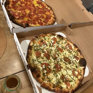 Delux pizza and margarita pizza. Both well done which I asked for