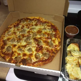 14" pepperoni &amp; sausage pizza. Sliced into 16 pieces (square) &amp; some garlic bread w/ marinara