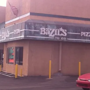Located near the actual restaurant, Bazil's To Go overlooks Sunrise Dr next to a yogurt place and former gas station.