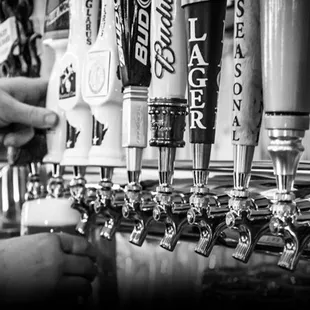 a person filling a beer