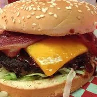 Bazinga Classic Bar &amp; Grille menu includes freshly prepared sandwiches, burgers, onion rings, and more