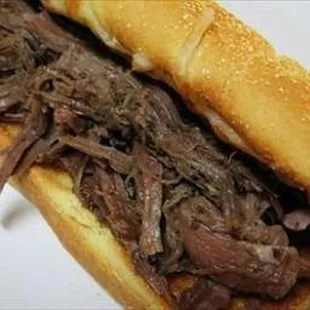 Bazinga Classic Bar &amp; Grille menu includes freshly prepared sandwiches, burgers, onion rings, and more