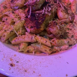 Cajun pasta with salmon and shrimp added