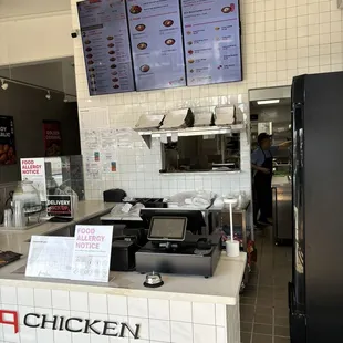 Counter and kitchen in the back