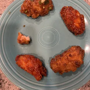 Boneless honey garlic, Gangnam, secret sauce, galbi, wings of fire.