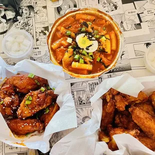 We got the Spicy Galbi Wings and the Honey Garlic Wings with some tteokbokki  bomb af!!