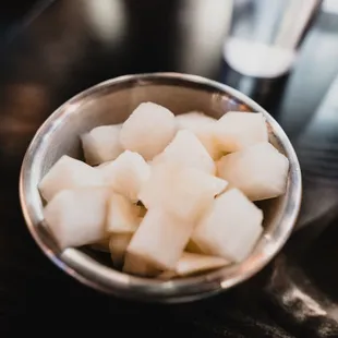 After ordering they give you pickeled radish. It's more on the sweet side. I found this useful to reset my pallate.