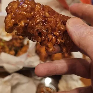 Thick breading around a nugget of chicken