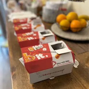 a carton of chicken on a table