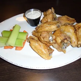 Wings with Ranch dipping sauce.