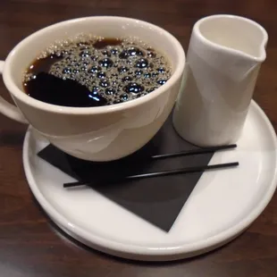 Fresh coffee with heavy cream.