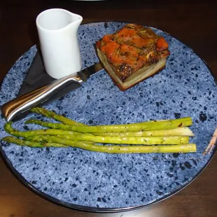 Pork Belly with balsamic reduction and asparagus.
